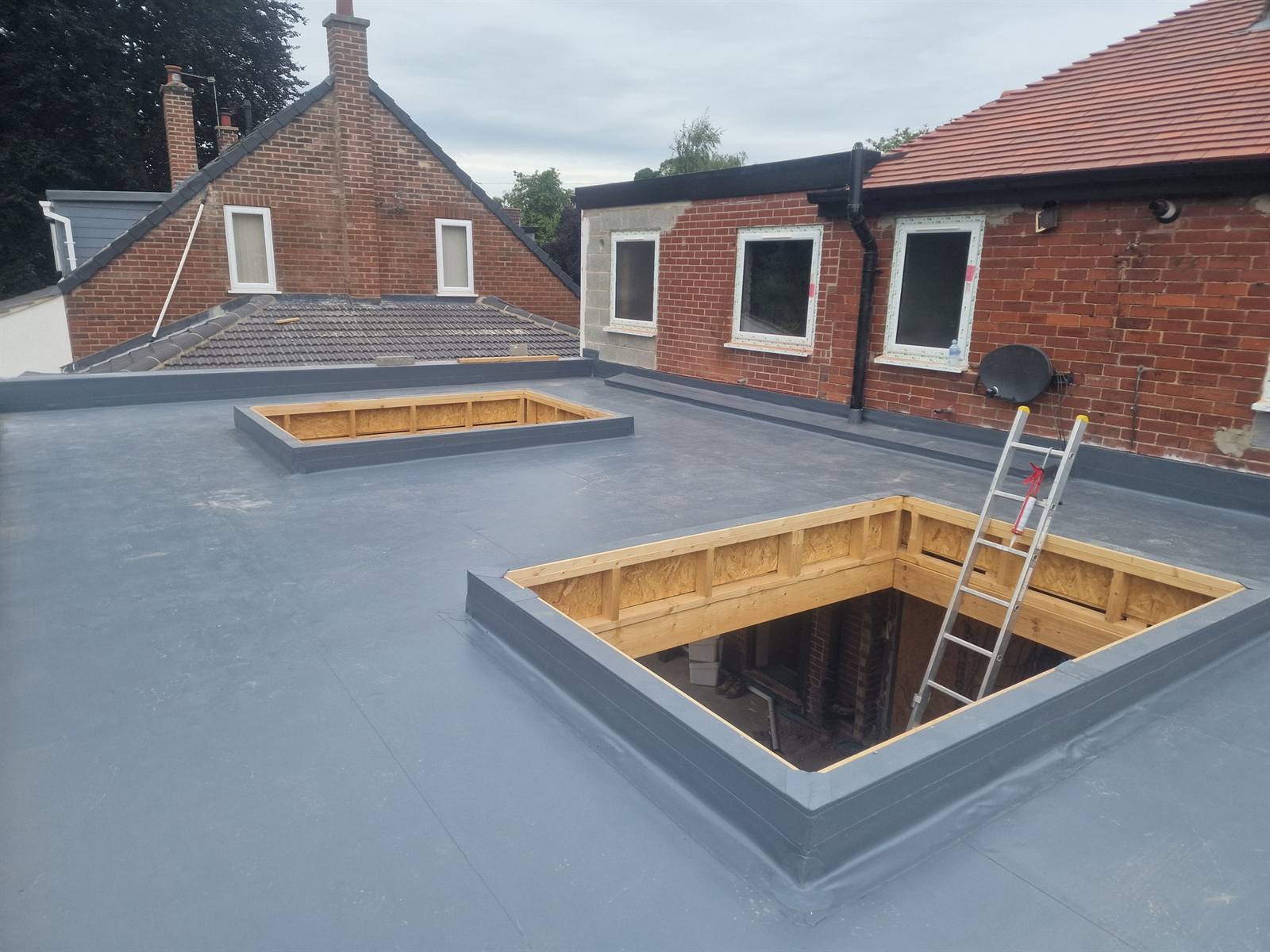 Flat Roof Leaking? Common Causes and What to Do