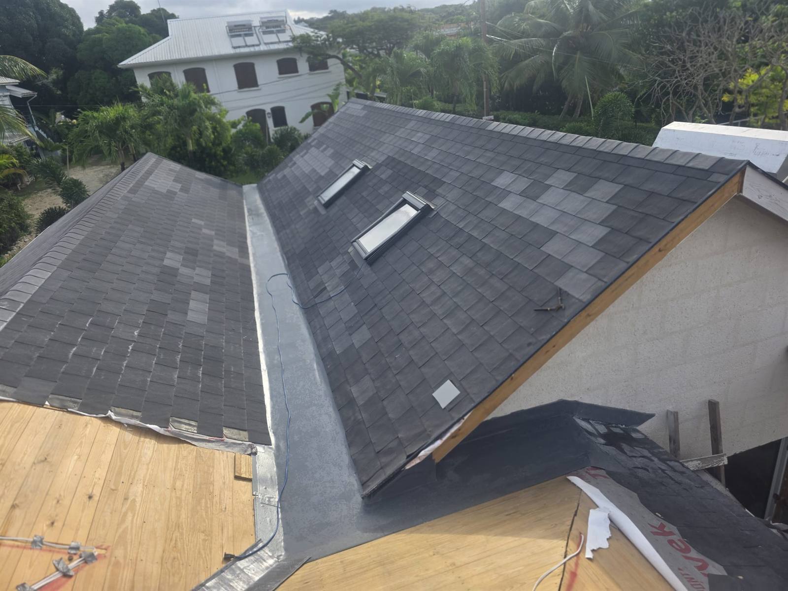 Fatra single-ply valley beneath a shingle roof in Barbados